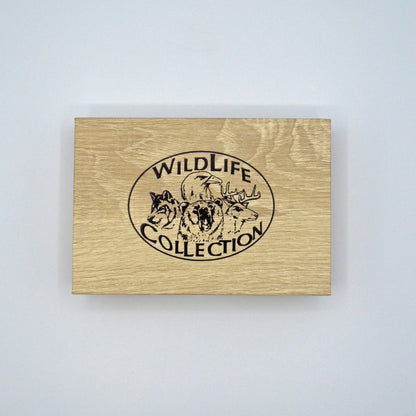 helle Geschenkbox mit Wolf, Adler, Bär und Hirsch als Logo auf dem Deckel, Schriftzug: WILDLIFE COLLECTION